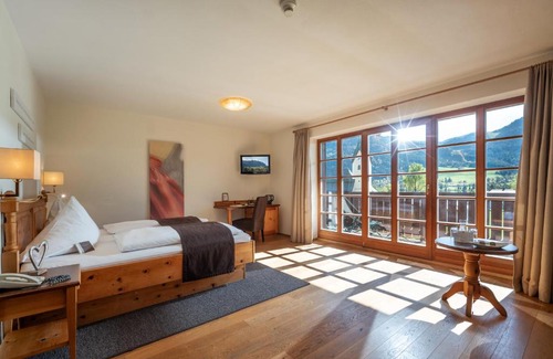 Walchsee Hotel | Pet-Friendly Retreat at Hotel Walchseer Hof with Ocean Views