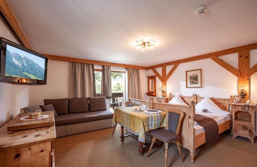 Walchsee Hotel | Pet-Friendly Retreat at Hotel Walchseer Hof with Ocean Views