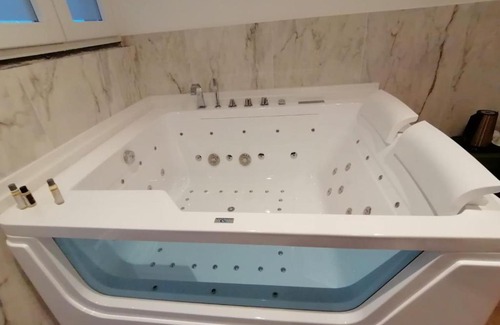 Saviano Hotel | Discover Hotel XBusiness: 4-Star Stay with Hot Tub Access