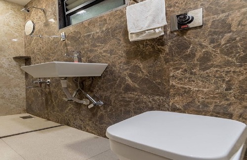 Akhol Hotel | Discover Hotel Zorba in Deesa: Rated 8/10 with Great Amenities