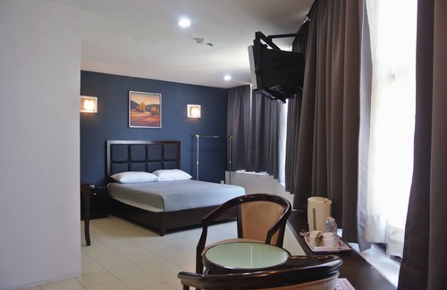 Jakar Hotel | Affordable Hotel88: Family-Friendly with Kitchen Amenities