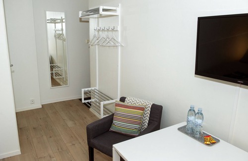 Vanersborg Hotel | Discover Hotell 46an: Eco-Friendly Stay with Pool & Breakfast