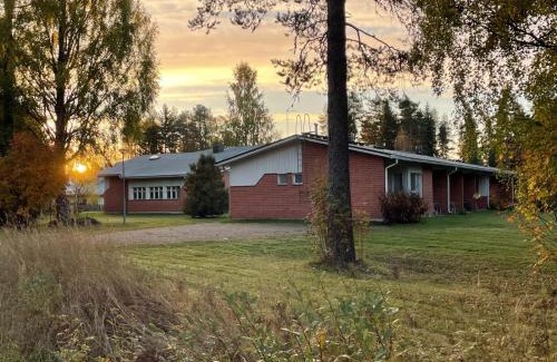 Rautavaara Hotel | Pet-Friendly Hotel Tiilikka with Oceanfront Pool Access