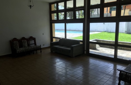 Balneario Praia do Pernambuco House | Beachside Retreat: House Steps from the Ocean in Guaruja
