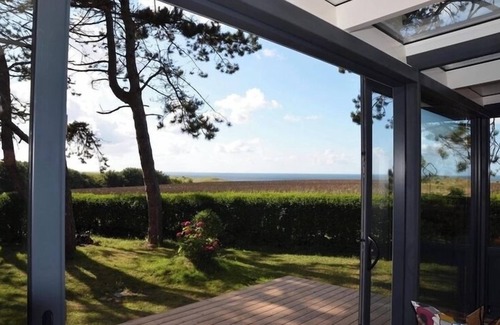 Commes House | House and workshop on a cliff in a protected site with unique sea view