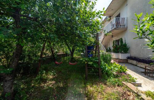Seget Vranjica Apartment | Escape to House Antonija: Relax by the Oceanfront Pool