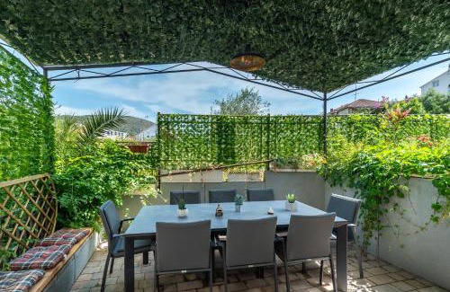 Seget Vranjica Apartment | Escape to House Antonija: Relax by the Oceanfront Pool