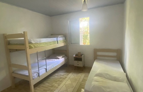 Guaeca House | Charming Beachfront House at Praia do Guaecá with Pool