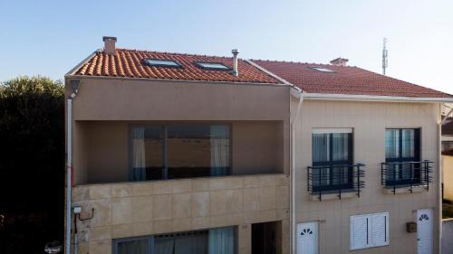 Aguda House | Oceanfront House in Aguda Beach: Rated 9/10 by Guests