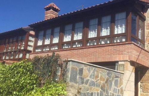 Comillas City Center House | Cozy Retreat in Comillas with Ocean Views & Spa Access