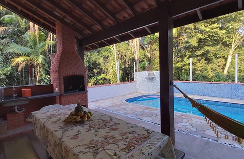 Guaratuba House | Inviting House in Guaratuba with Pool & BBQ Area, Rated 9.8