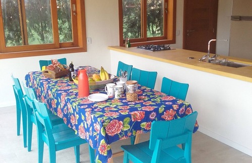 Balneario Praia do Pernambuco House | Family Retreat in Guarujá: Steps from the Beach & Pool