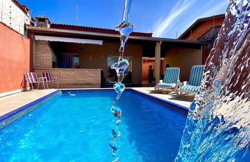 Raul Cury House | Stunning House in Itanhaém with Pool, Steps from the Beach