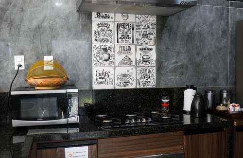 Praia Grande House | House in Praia Dos Anjos, 250m from the beach with air conditioning