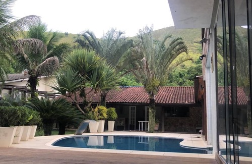 Frade House | Serene House in the Woods with Oceanfront Amenities