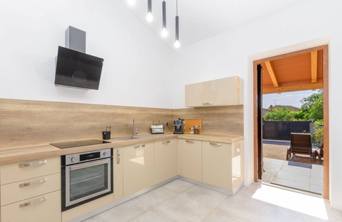 Pomer House | House Julia: Oceanfront Retreat with Perfect Review Score