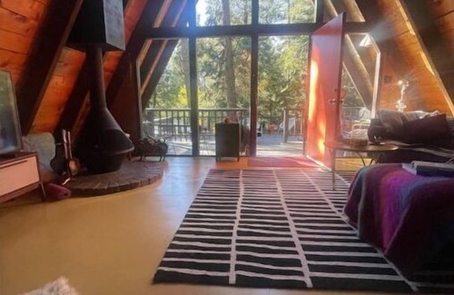 Fern Valley Cabin | Woodsy Retro A-Frame Cabin with Hot Tub & Family-Friendly Perks