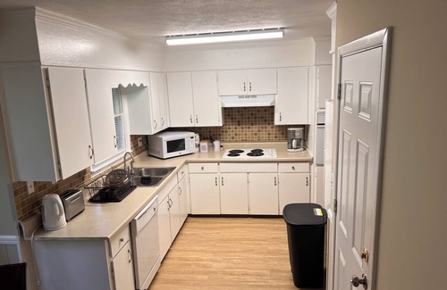 Anniston House | Relax at House of Prayer: 3-Bedroom Retreat with Spa