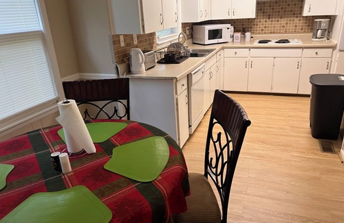 Anniston House | Relax at House of Prayer: 3-Bedroom Retreat with Spa