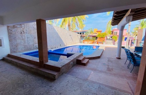 Barra de Navidad House | House on the canal private dock and pool