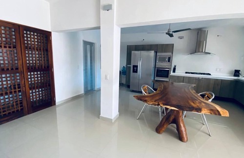 Barra de Navidad House | House on the canal private dock and pool