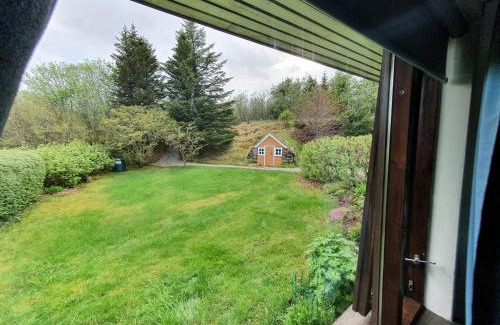 Hornafjörður House | Enchanting House with Magical Garden & Child-Friendly Sunroom