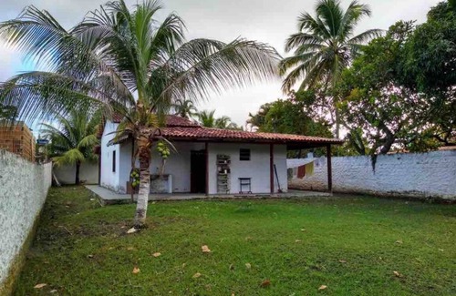 Aratuba House | Explore a Spacious House with Land in Berlinque, Brazil