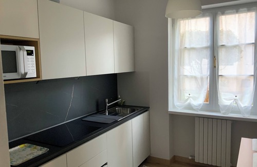Cannobio House | Cozy House with Garden, Steps from Beach & City Center