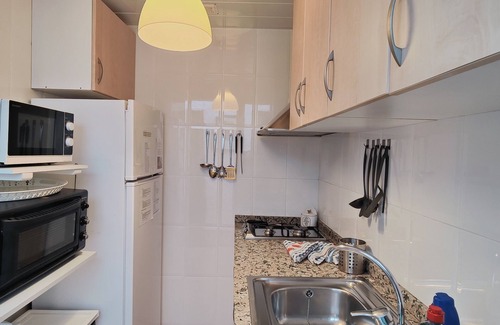 La Fosca House | Cozy House with Garden, Steps from La Fosca Beach