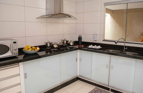 Trindade House | Pet-Friendly House with Gourmet Balcony for Memorable Stays
