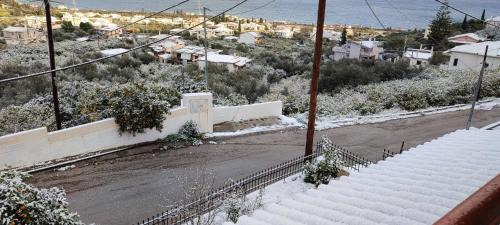 Evrostina House | Cozy Retreat with Scenic Sea and Mountain Views