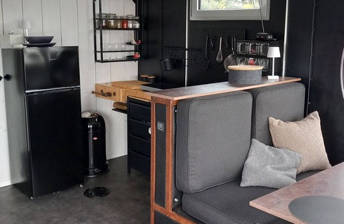 Center Boat Rental | Houseboat "Frodewin" experience on the water in Aurich harbor