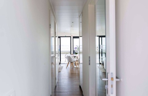 Offingawier Boat Rental | Discover a Modern Houseboat with Terrace in Offingawier
