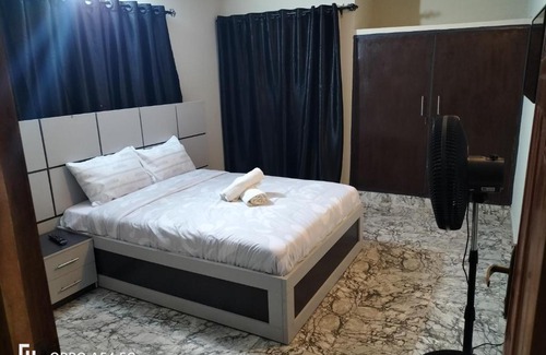 Ibadan Apartment | Family-Friendly Stay at Houseproud with Kitchen Amenities
