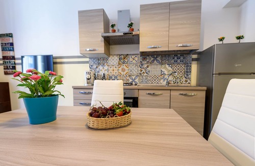 Corso dei Mille - Sant'Erasmo House | Inviting Housestation: Spa, Breakfast & Family-Friendly Stay