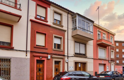 Leon Apartment | Discover Housingleon: Main Square Retreat with Garage Access