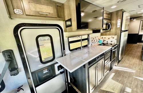 Elgin House | Howdy RV - 2023 Luxury Motor Coach - Sleeps 10