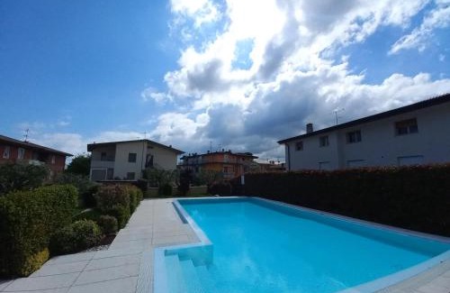 Lugana Apartment | Inviting HOYA APARTMENT: Rated 9.8 with Pool & Family Perks