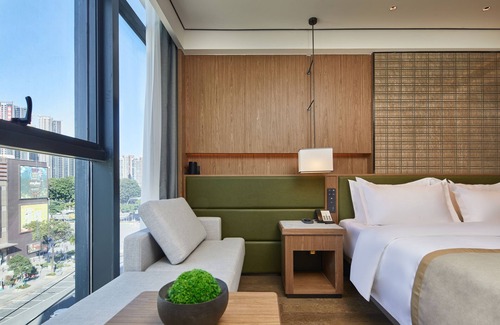 Miaolingjiuwei Hotel | Discover HuaMan Hotel DongGuan TangXia - Family-Friendly Stay