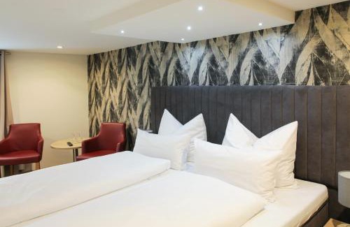 Goslar Old Town Hotel | Welcoming Hubertus Hof: Family-Friendly Getaway Awaits