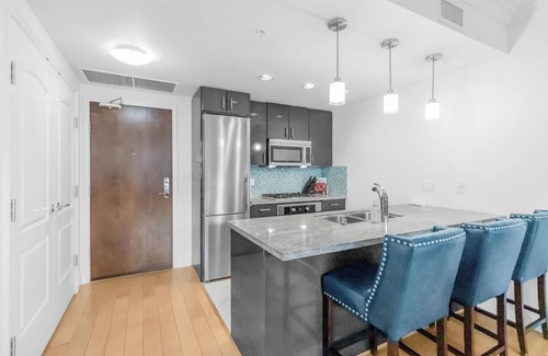 Lower Lonsdale Apartment | Spacious Waterfront Retreat with Huge Balcony & Family-Friendly