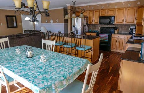 South End Condo | Spacious Four Bedroom Condo Steps from the Beach