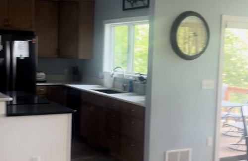 Manistee House | Ideal Bar Lake Retreat with Spa and Ocean View Amenities