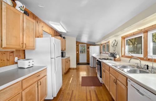 Newaygo House | Spacious Lake House Retreat with Beach & Fire Pit