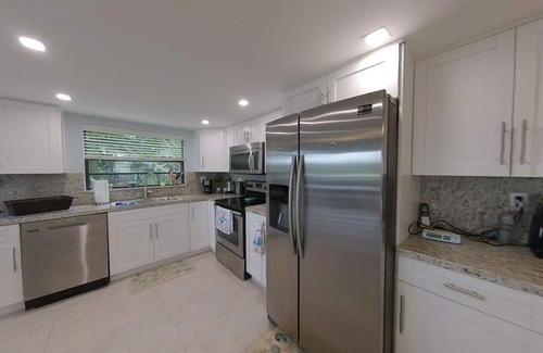 Ocean Isle Estates House | Captivating Oceanfront Retreat with Dock Space & Spa