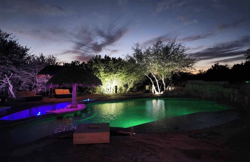Pedernales Canyon Ranch House | Huge Updated RV that sleeps 8 in enchanting Spicewood. Pool, Hot tub, Steam room