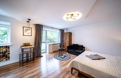 Siauliai City Center Apartment | Cozy Hugo Apartment: Pet & Child Friendly Stay Awaits