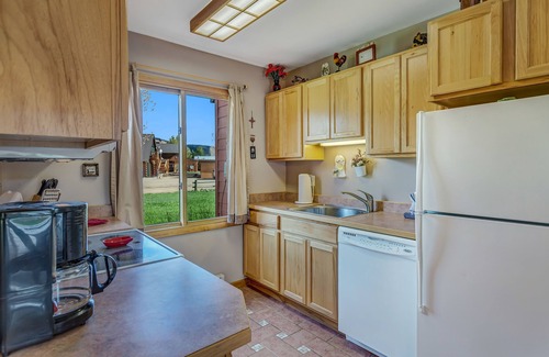 Clark Cabin | Cozy Rainbow Cabin: 2BR/2BA with River Views & Hot Tub