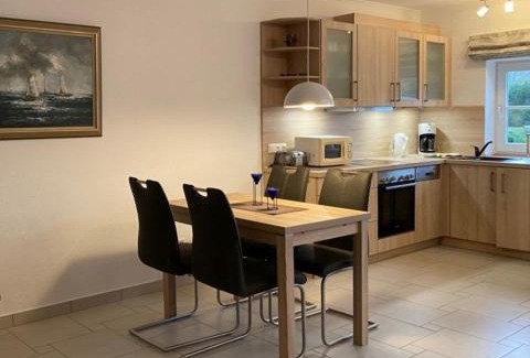 Busumer Deichhausen Apartment | Oceanfront Getaway at Hus op de Wurth Nr 9 - 4 Star Stay