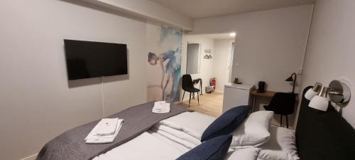Husnes House | Pet-Friendly Stay at Husnes Sentrum Hotell with Breakfast